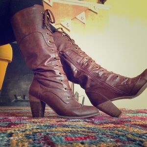 Brown lace boots.